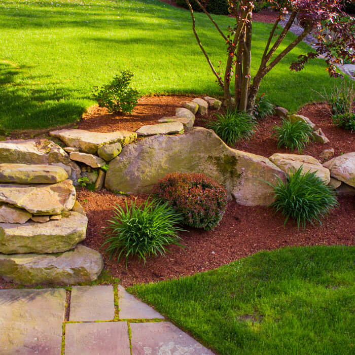 yard landscaping with rock stairs